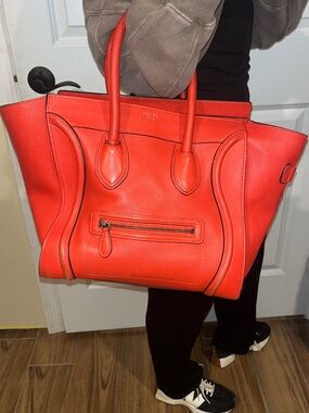 CELINE
Drummed Calfskin Mini
Luggage in  Vermillion Orange